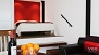 Seville Apartment - The bedroom alcove has a comfortable double bed and overlooks the living area.