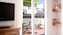 Seville Apartment - Sliding doors open onto the terrace.