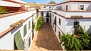 Seville Apartment - View towards the courtyard of the house from the terrace.