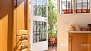 Seville Apartment - The kitchen and door to the terrace - upper floor.