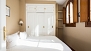 Seville Apartment - Bedroom 3 with double bed. All rooms have built-in wardrobes to store your belongings.