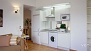 Seville Apartment - The kitchen forms part of the living area.
