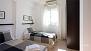 Seville Apartment - Bedroom 2 with two twin beds, wardrobe and window facing the terrace.