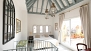 Seville Apartment - Bedroom on the upper floor. Sliding doors open to the private terrace.