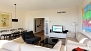 Seville Apartment - Living-dining area