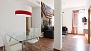 Seville Apartment - Dining area with table and chairs. There are additional chairs available.