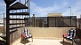 Seville Apartment - The bedroom leads out to the private terrace.